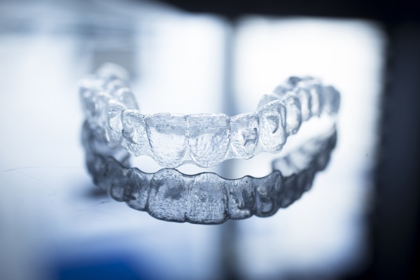 How Can Treatment From An Invisalign® Dentist Help?